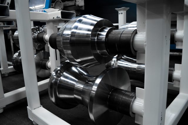 Roll form roll tooling in its stands